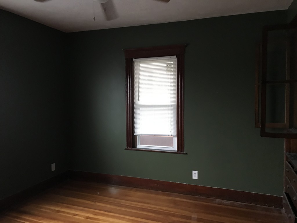 27 Floyd Street Revere, MA 02151 - Photo 16 of 21 a view of a small space with wooden floor and a window