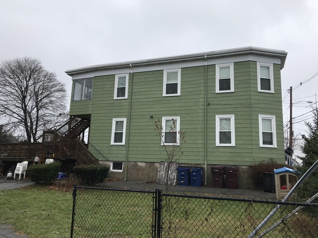 27 Floyd Street Revere, MA 02151 - Photo 3 of 21 a front view of a house with a yard