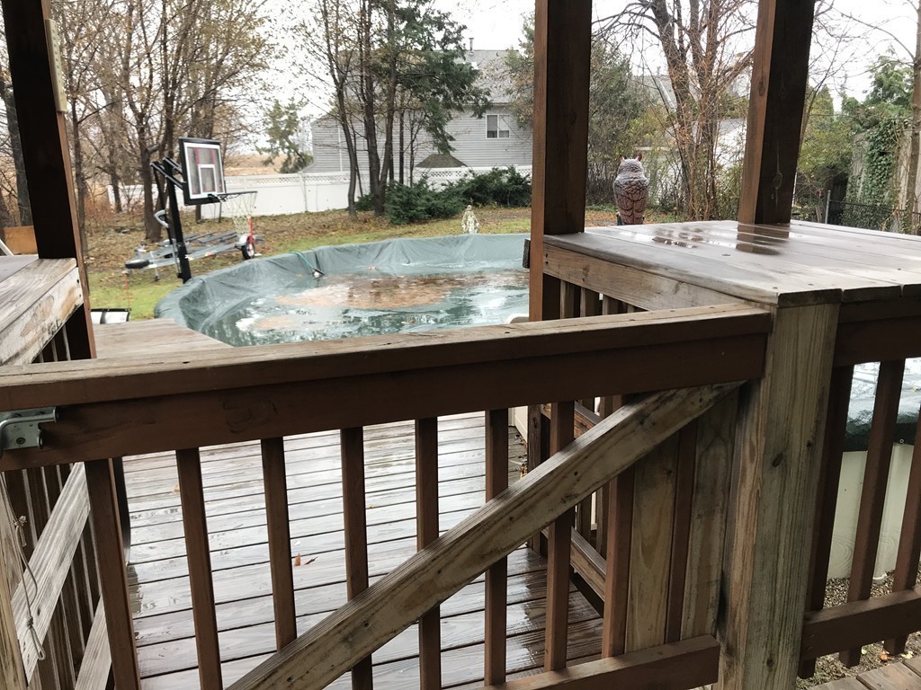 27 Floyd Street Revere, MA 02151 - Photo 6 of 21 a view of balcony with wooden floor and outdoor seating