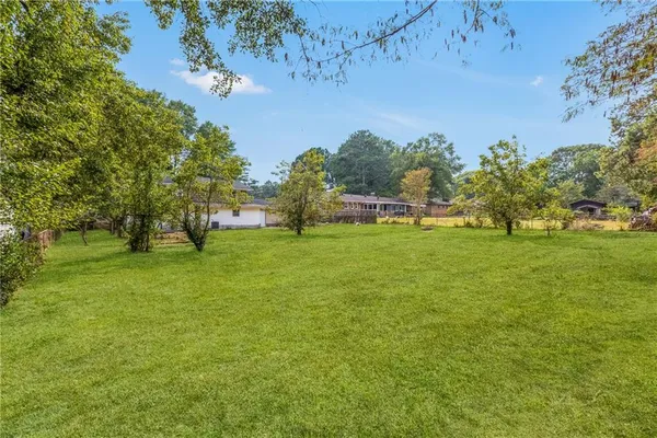 a house view with a garden space