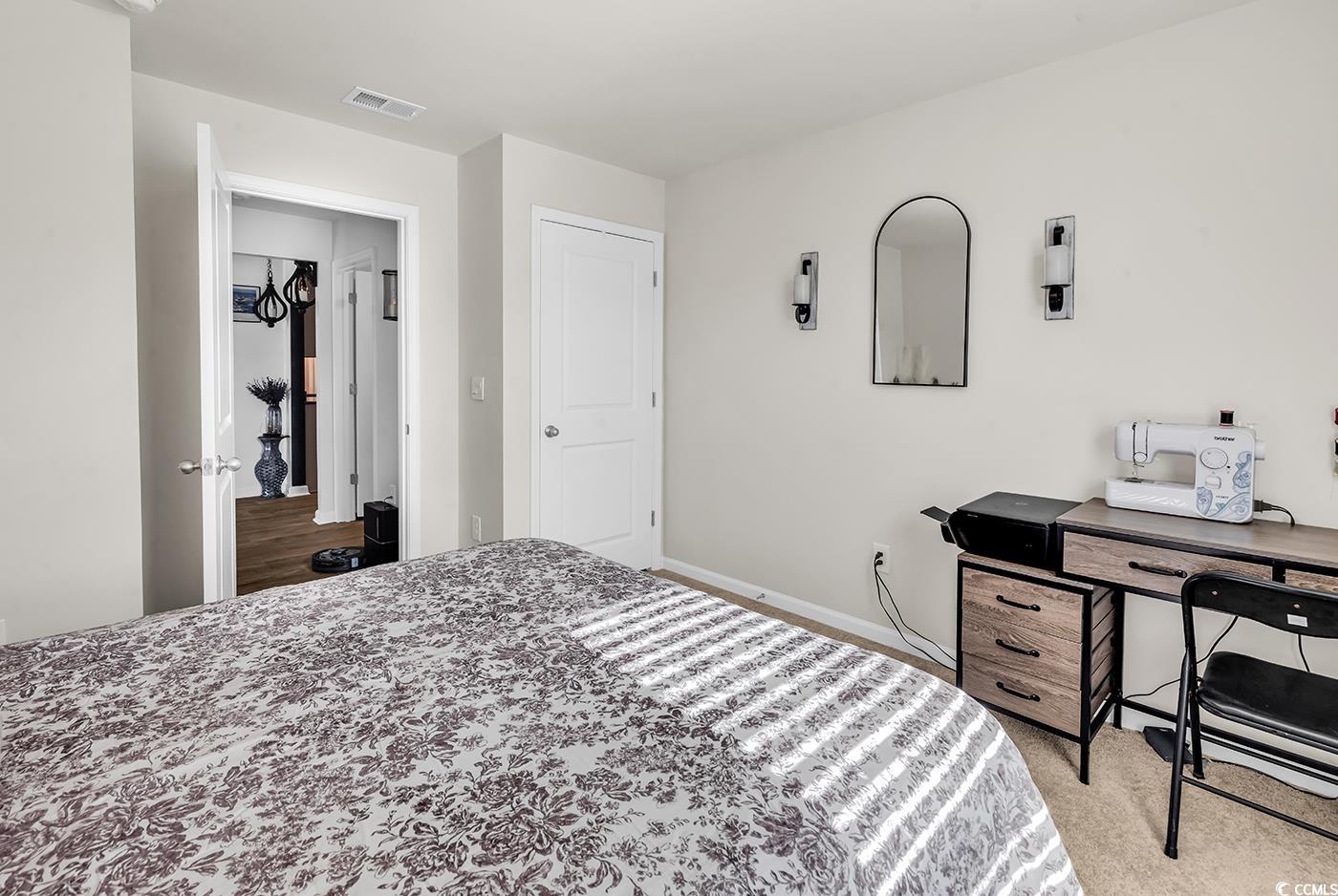 164 Seasons Trace Loop Longs, SC 29568 - Photo 29 of 40 Carpeted bedroom featuring baseboards