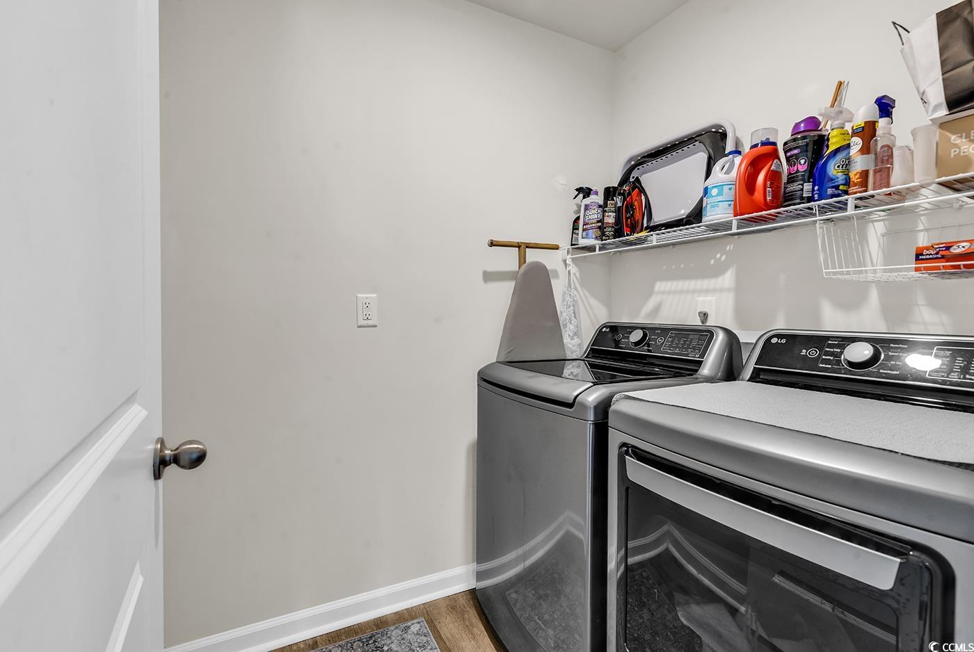 164 Seasons Trace Loop Longs, SC 29568 - Photo 30 of 40 Laundry room with washer and dryer and light wood-style flooring