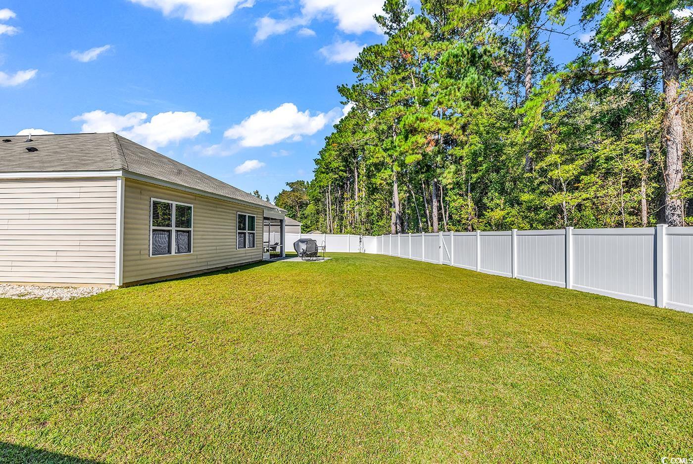 164 Seasons Trace Loop Longs, SC 29568 - Photo 31 of 40 View of fenced backyard