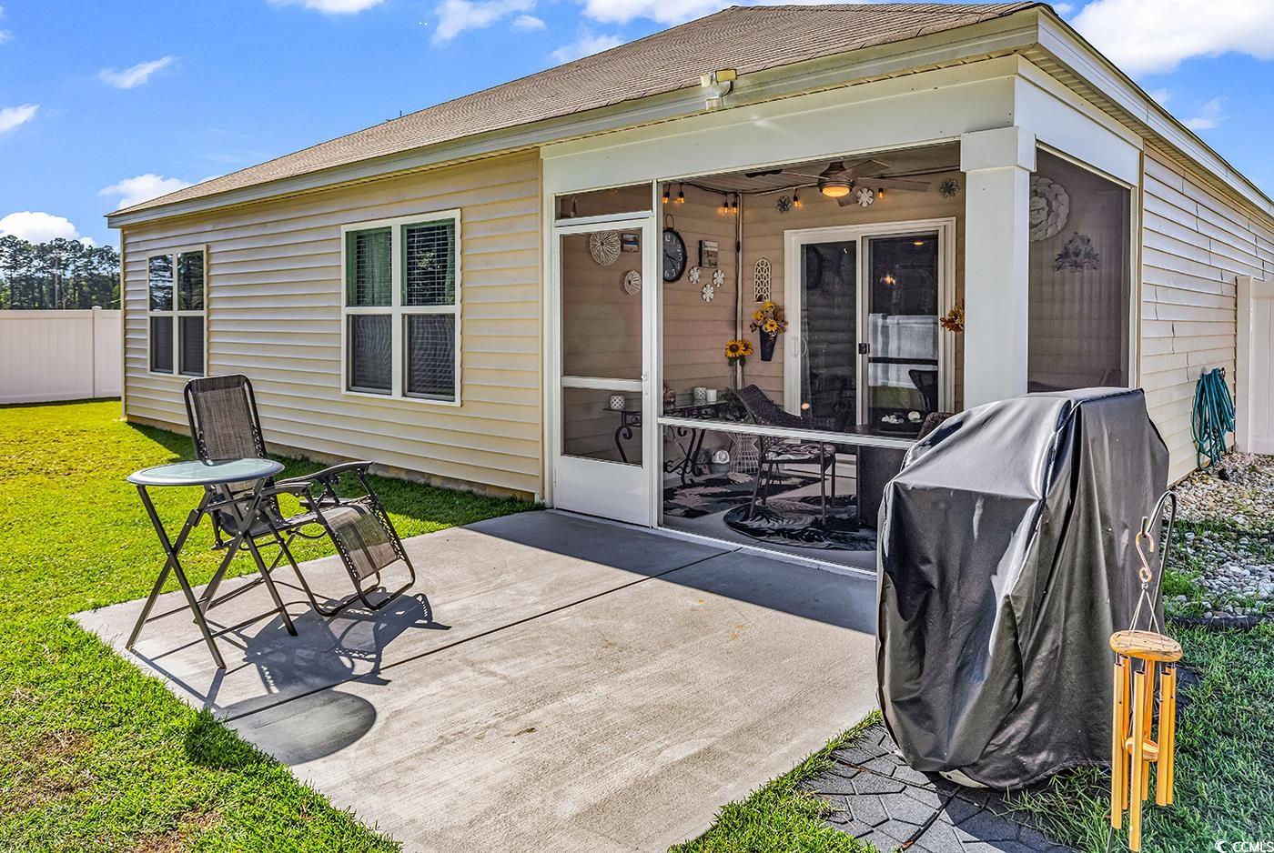164 Seasons Trace Loop Longs, SC 29568 - Photo 35 of 40 Rear view of house with a patio, a shingled roof, and ceiling fan