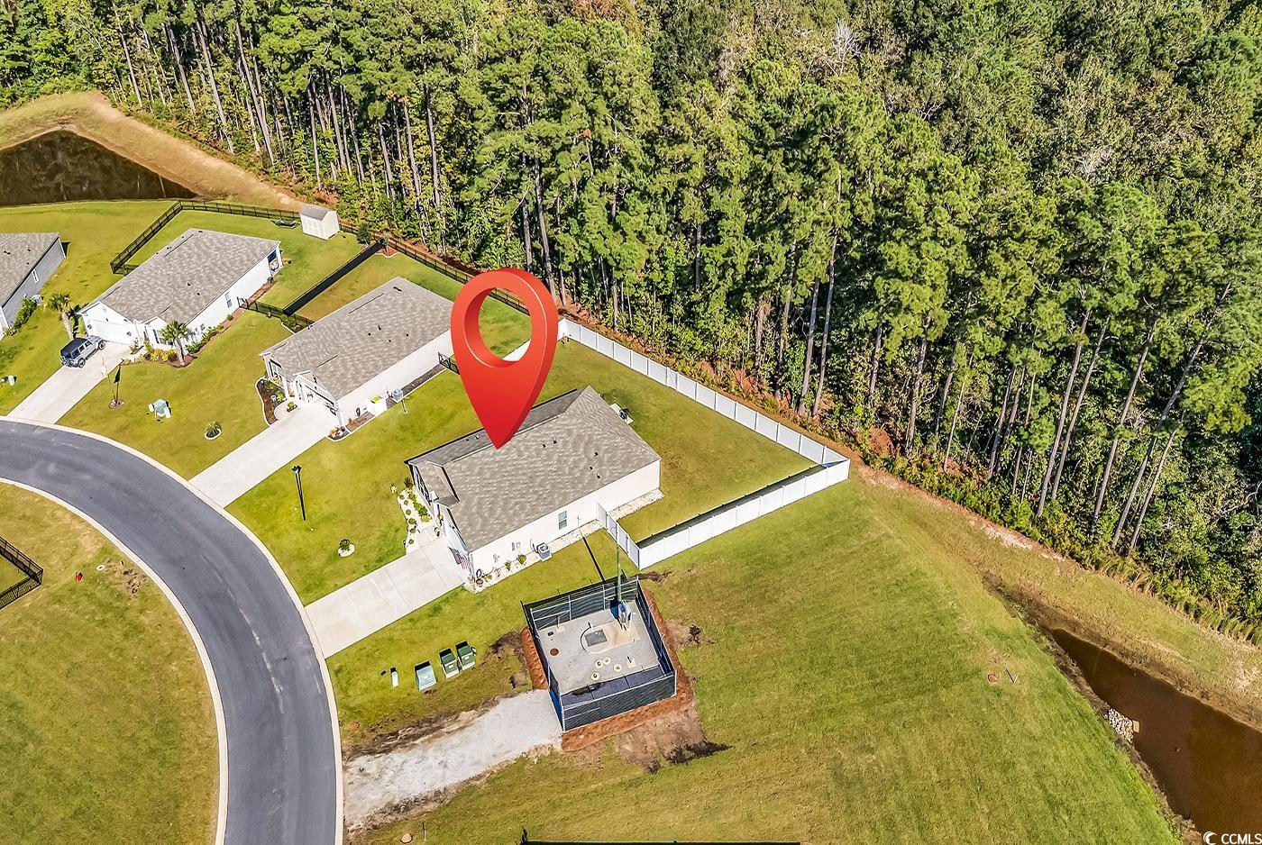 164 Seasons Trace Loop Longs, SC 29568 - Photo 38 of 40 Bird's eye view of a large body of water and a forest
