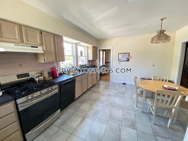 75 Claymoss Road, Unit 1 Boston, MA 02135 - Photo 3 of 25 a kitchen with stainless steel appliances granite countertop a stove a sink dishwasher and a refrigerator