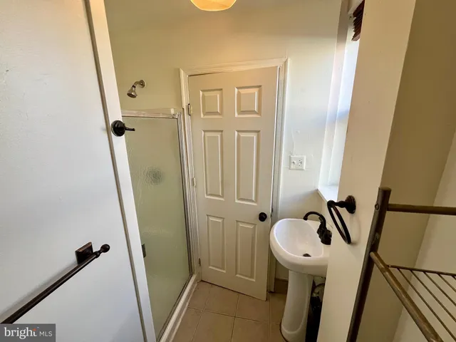 a kitchen with stainless steel appliances granite countertop a stove a sink dishwasher and a refrigerator