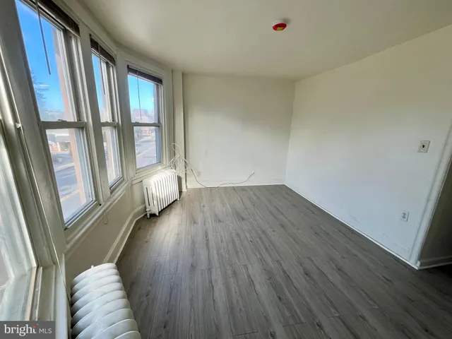 a view of livingroom with furniture and wooden floor