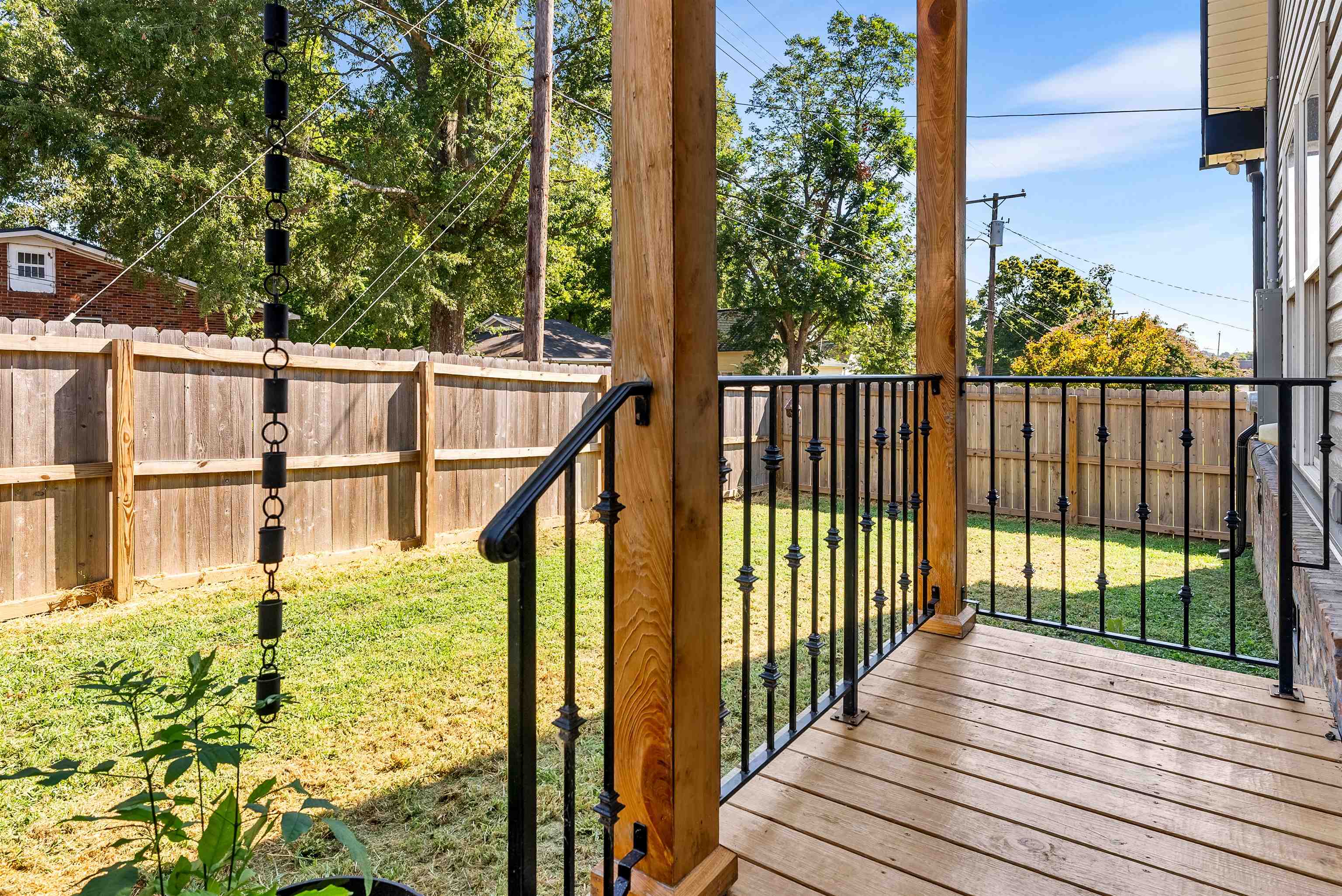 212 South Tipton Street Covington, TN 38019 - Photo 21 of 27 a view of balcony with wooden floor and fence
