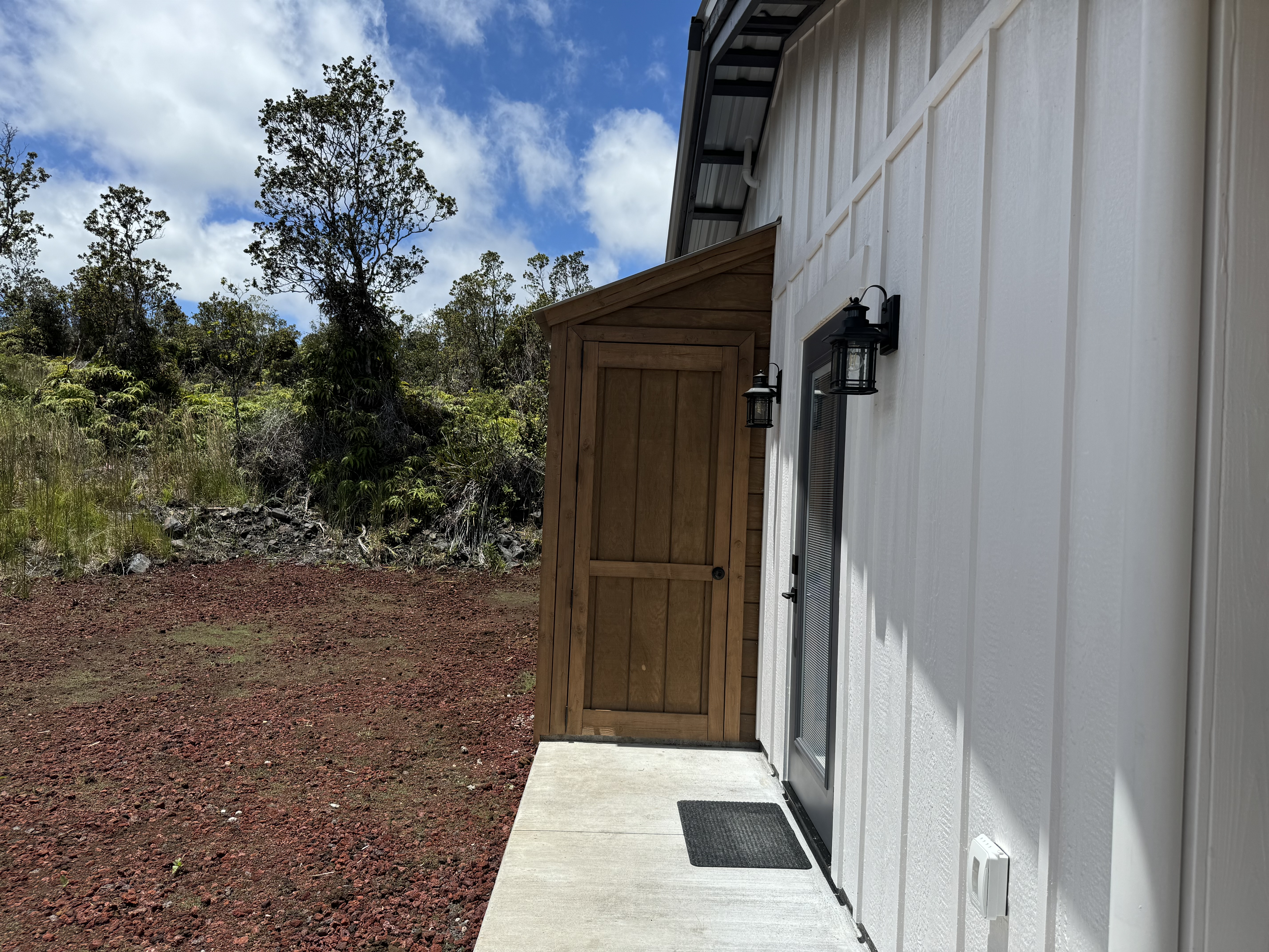 11-3229 Volcano Road Volcano, HI 96771 - Photo 20 of 30 a view of a house with a backyard