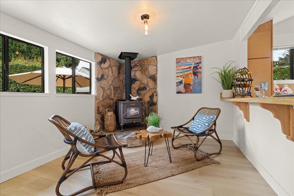 214 Rigg Street Santa Cruz, CA 95060 - Photo 13 of 32 a living room with furniture and a painting on the wall