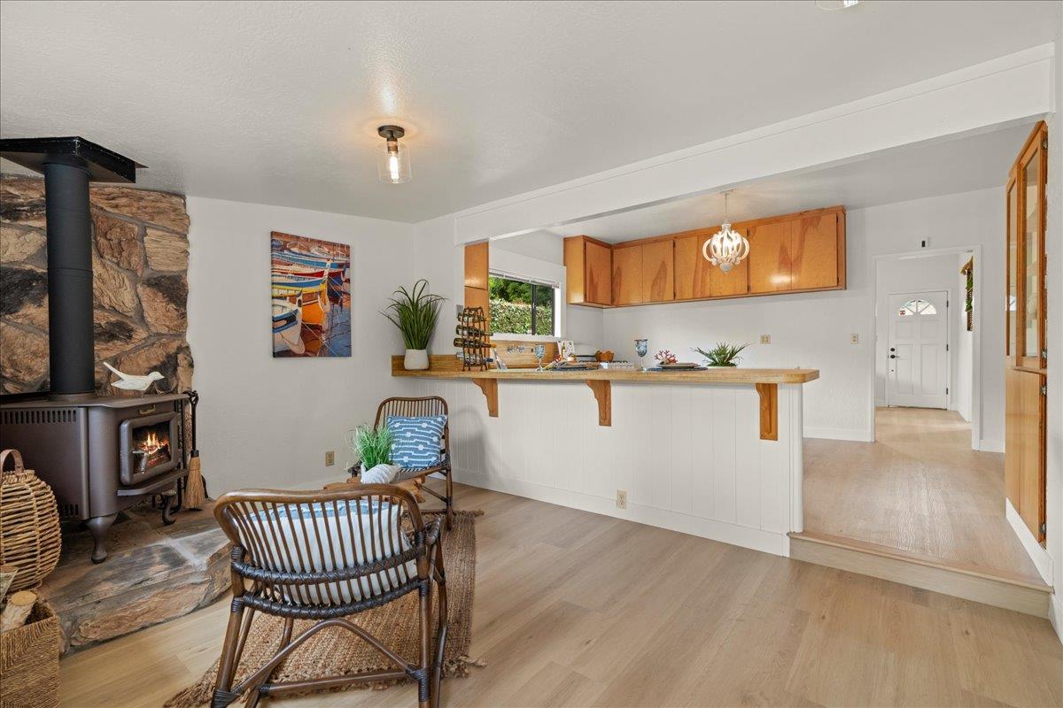 214 Rigg Street Santa Cruz, CA 95060 - Photo 14 of 32 a living room with furniture and a wooden floor