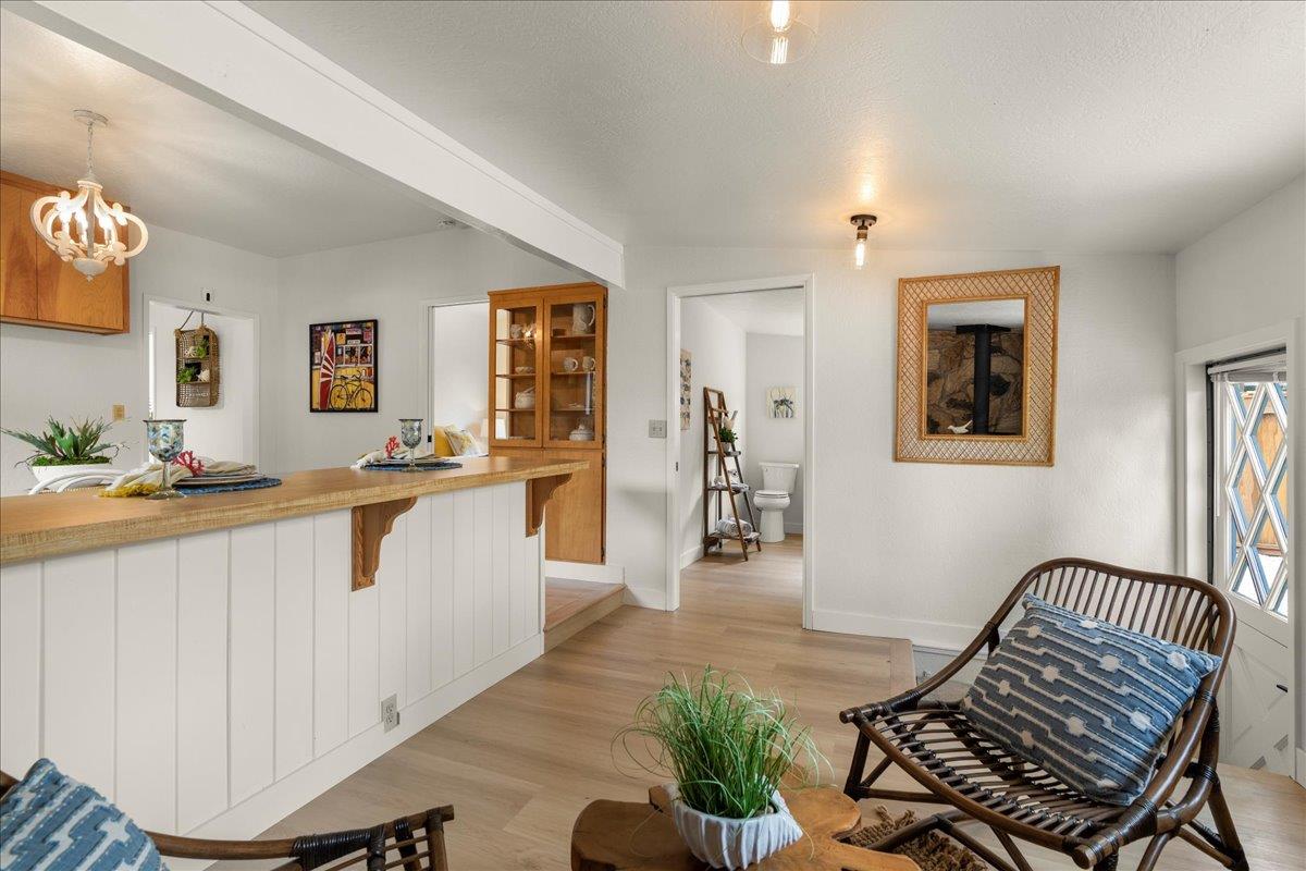 214 Rigg Street Santa Cruz, CA 95060 - Photo 15 of 32 a living room with furniture and a wooden floor