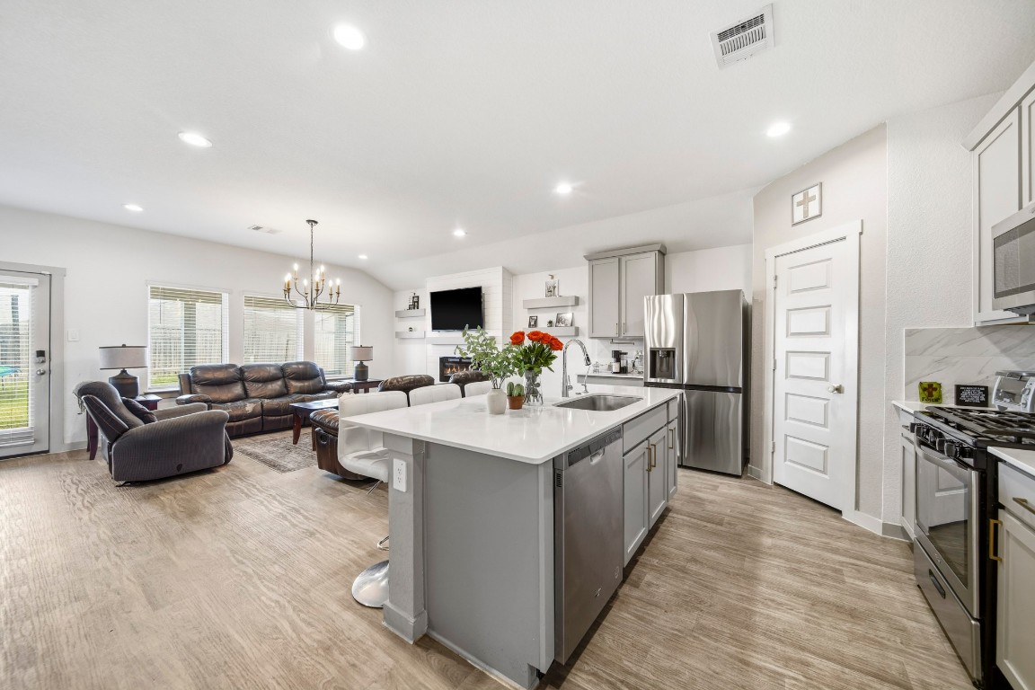 8210 Buck Lane Rosharon, TX 77583 - Photo 14 of 30 Spacious open living and kitchen area ideal for entertaining and daily living.