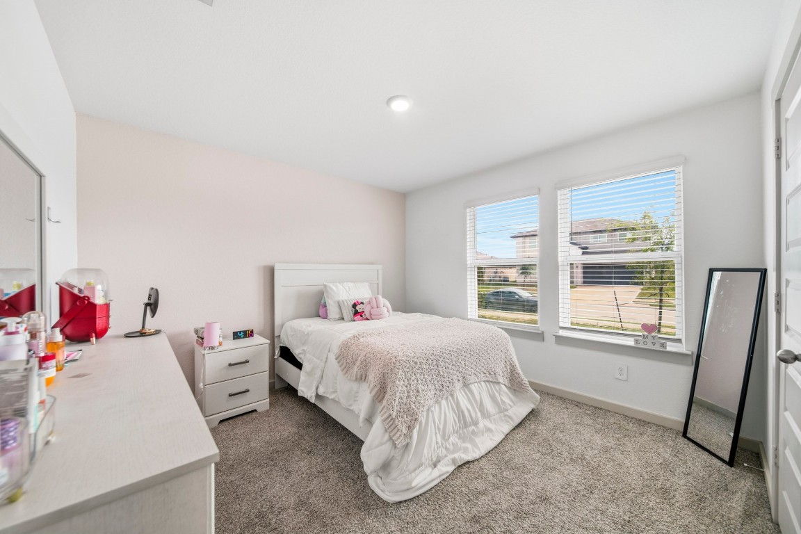 8210 Buck Lane Rosharon, TX 77583 - Photo 19 of 30 Bright bedroom with large windows allowing for plenty of natural light.