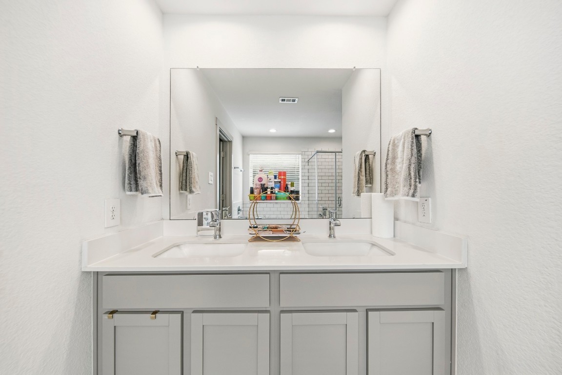 8210 Buck Lane Rosharon, TX 77583 - Photo 20 of 30 Double vanity setup providing convenience and extra storage space.