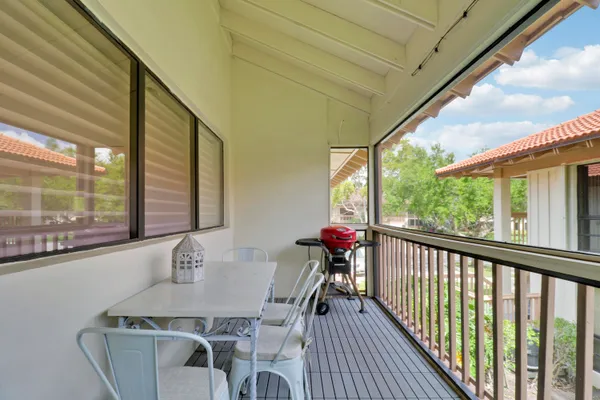 a view of a porch with a yard