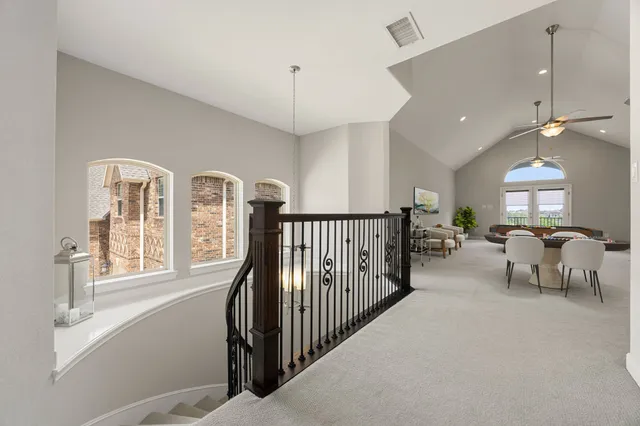 a view of a livingroom with furniture and windows