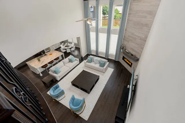 a view of living room with furniture and a window