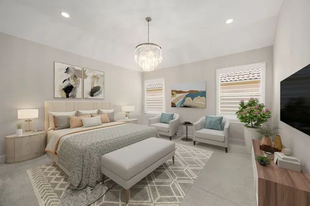 a spacious bedroom with a bed and a couch