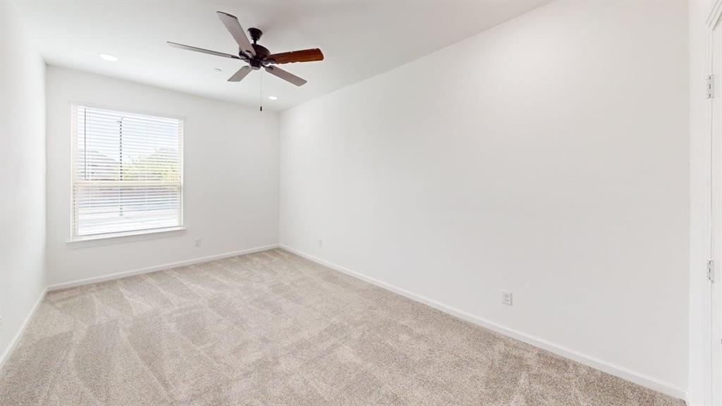 285 Buck Ridge Drive Frisco, TX 75068 - Photo 11 of 20 Empty room featuring light carpet, a ceiling fan, and recessed lighting