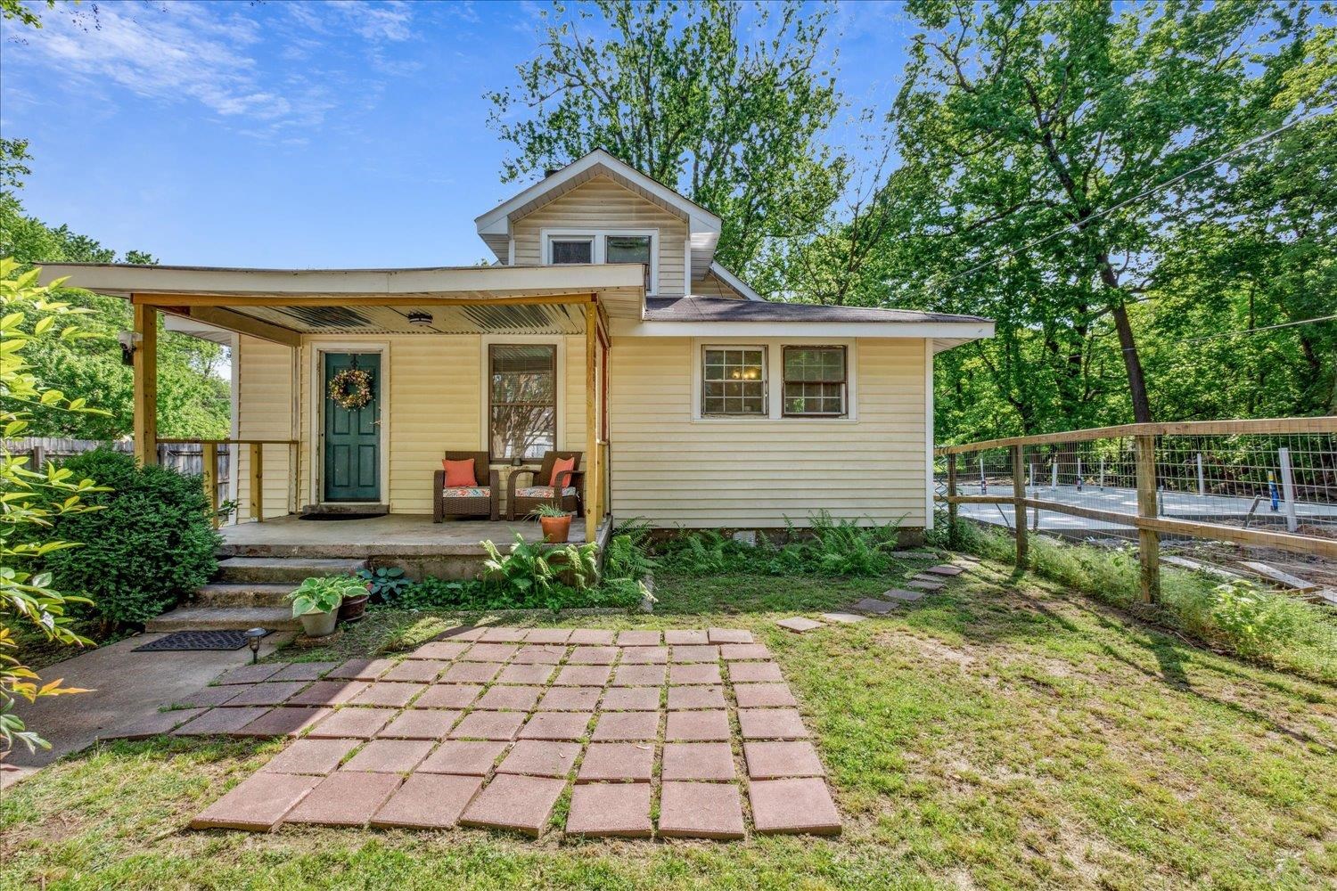 3707 Whittier Road Memphis, TN 38108 - Photo 3 of 35 a front view of a house with garden