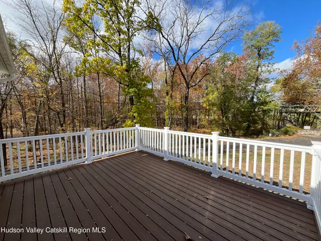 a view of a wooden roof deck