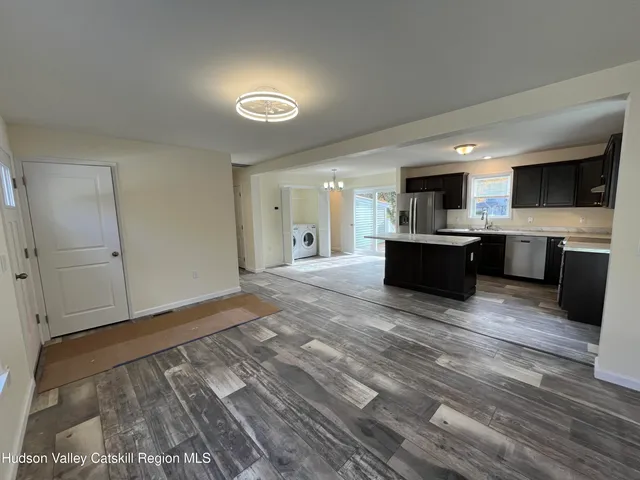 a view of kitchen and microwave