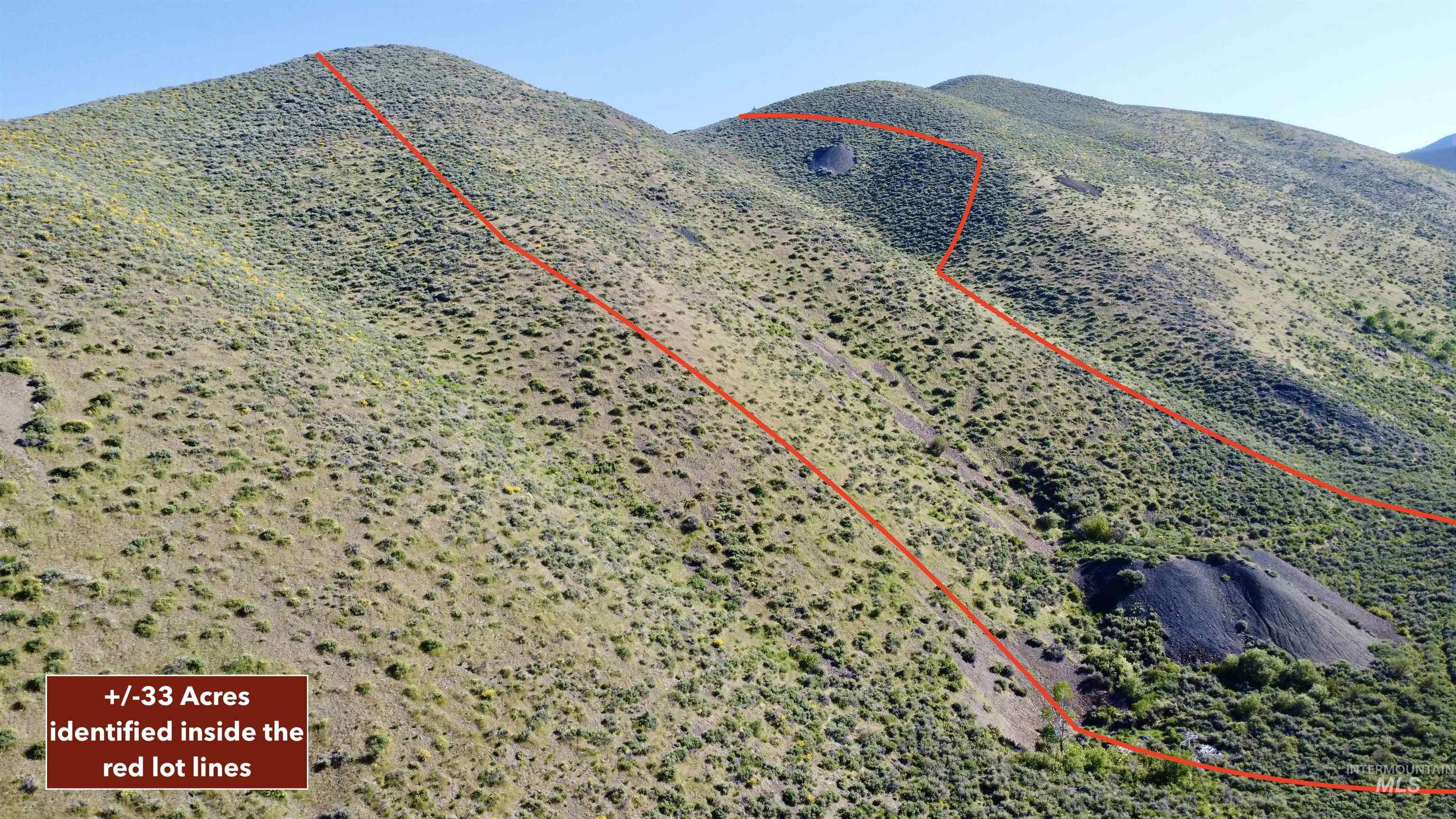 120 Keystone Street Sun Valley, ID 83353 - Photo 16 of 37 Aerial view of property and surrounding area featuring mountains and property parcel outlined