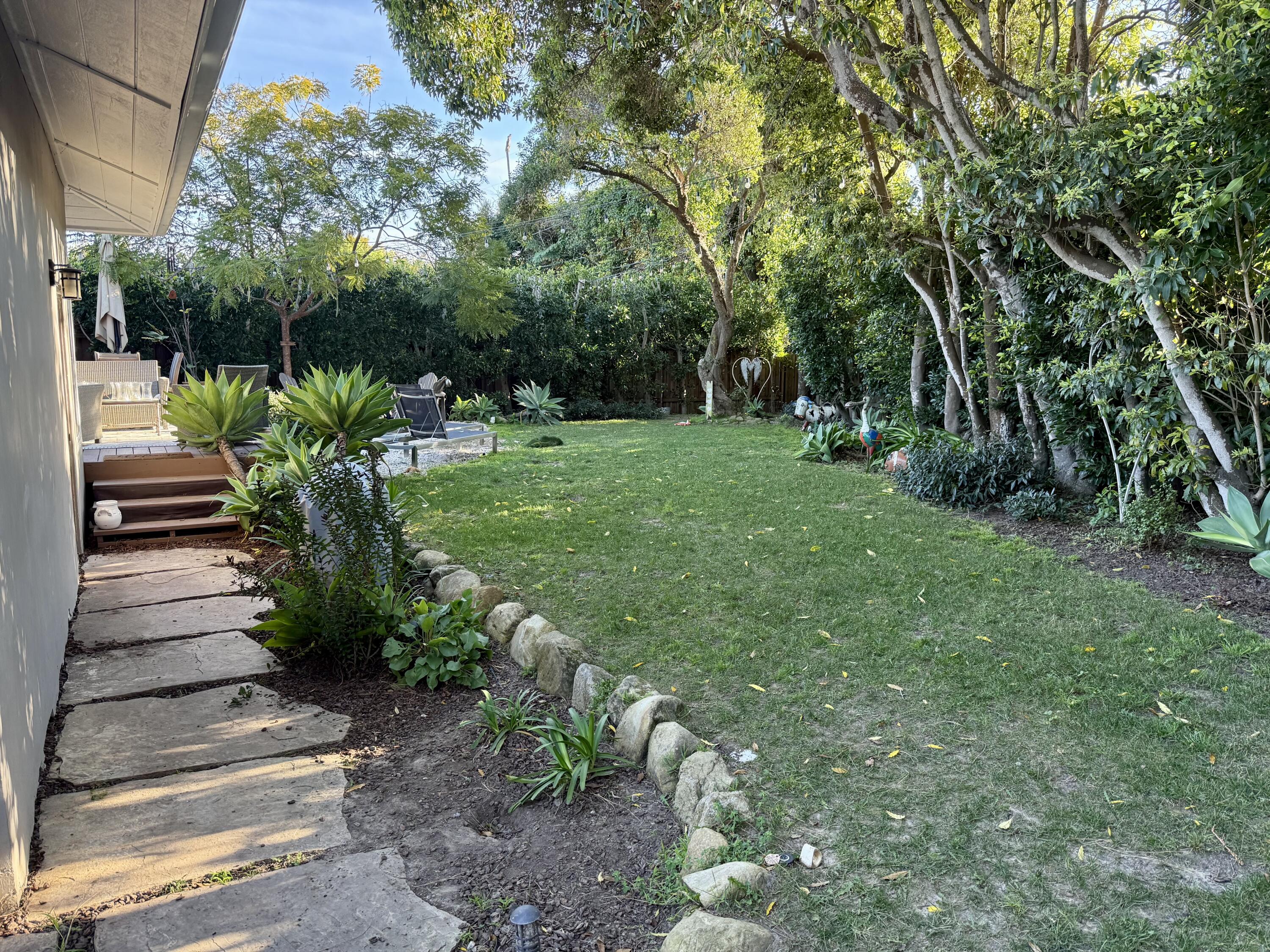 1353 Pacific Santa Barbara, CA 93109 - Photo 14 of 14 a view of a garden with plants and large trees