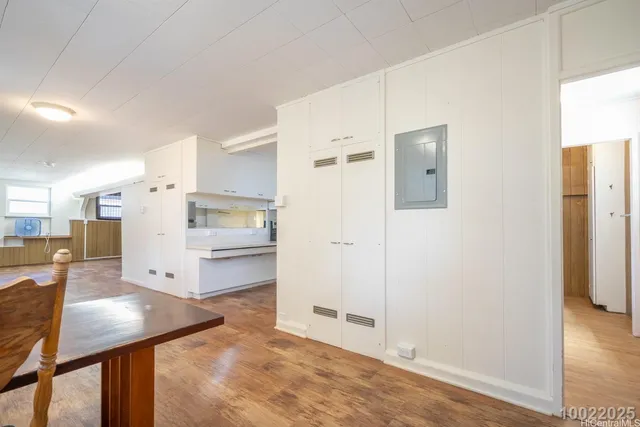 a view of a kitchen with a sink cabinets and a window