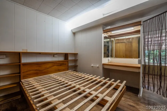 a view of a room with wooden walls