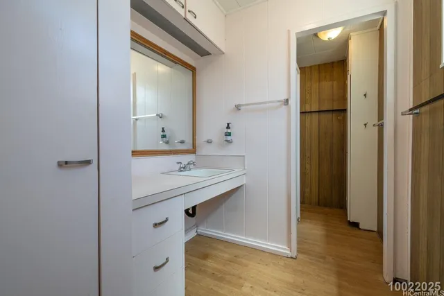 a bathroom with a glass door shower