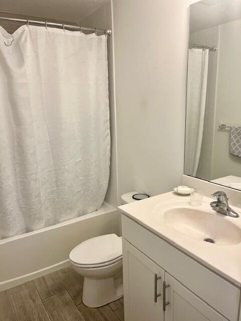 3665 Southeast Lower Street Stuart, FL 34997 - Photo 11 of 20 a bathroom with a sink a toilet and shower