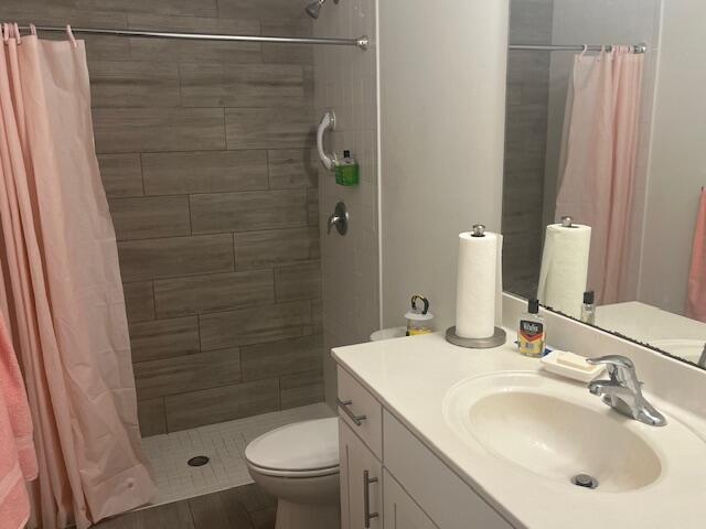 3665 Southeast Lower Street Stuart, FL 34997 - Photo 14 of 20 a bathroom with a sink toilet and shower