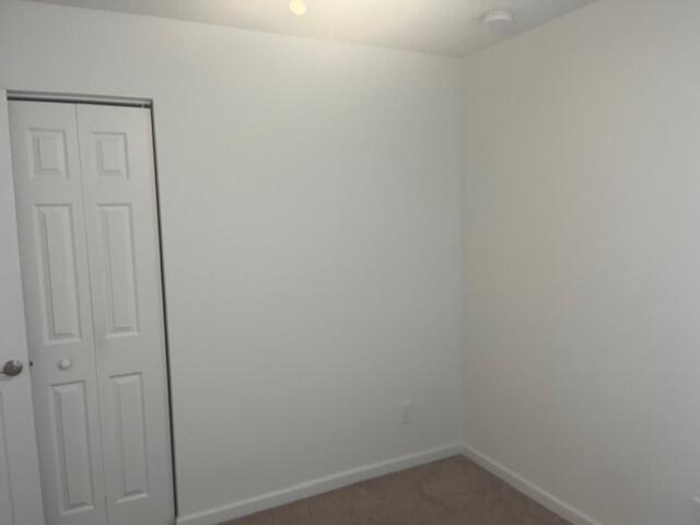 3665 Southeast Lower Street Stuart, FL 34997 - Photo 18 of 20 a small space with a door