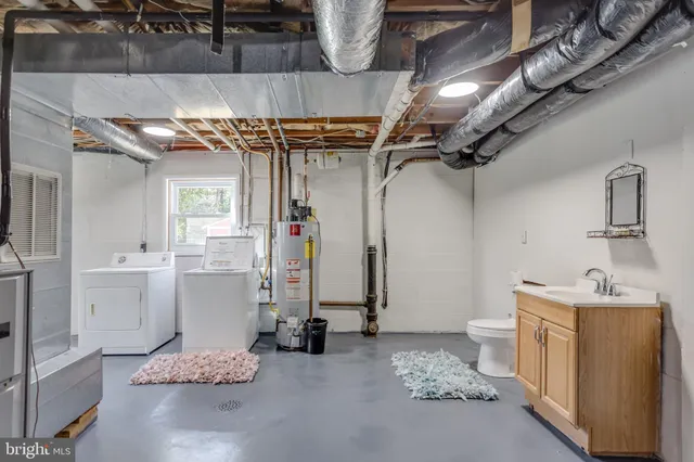 a view of hall way with furniture