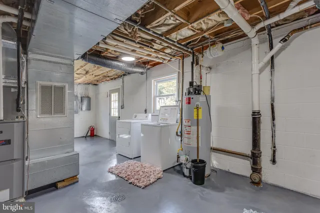 a bathroom with a sink a mirror and a shower