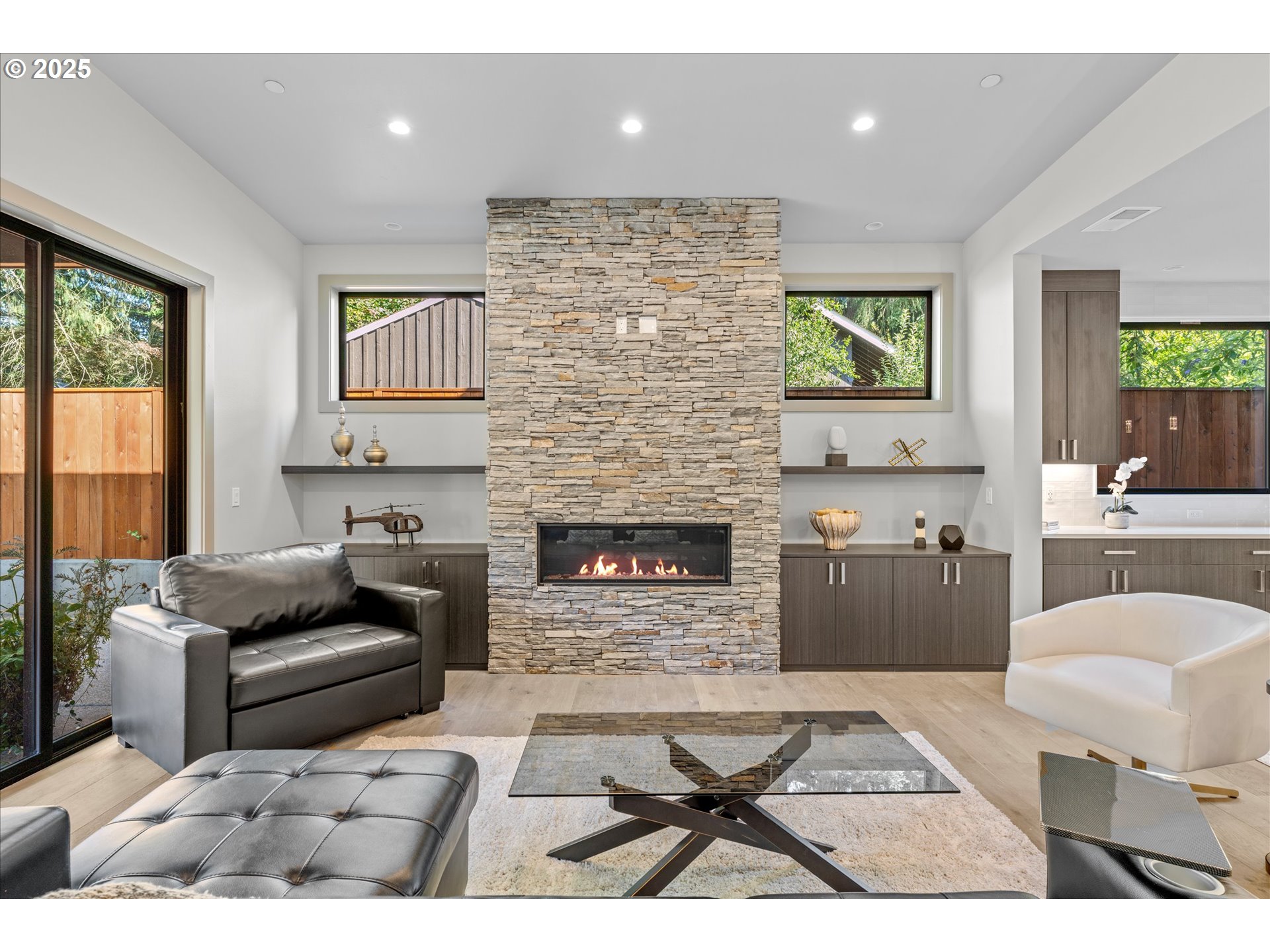15003 Twin Fir Road Lake Oswego, OR 97035 - Photo 16 of 42 a living room with furniture and a fireplace