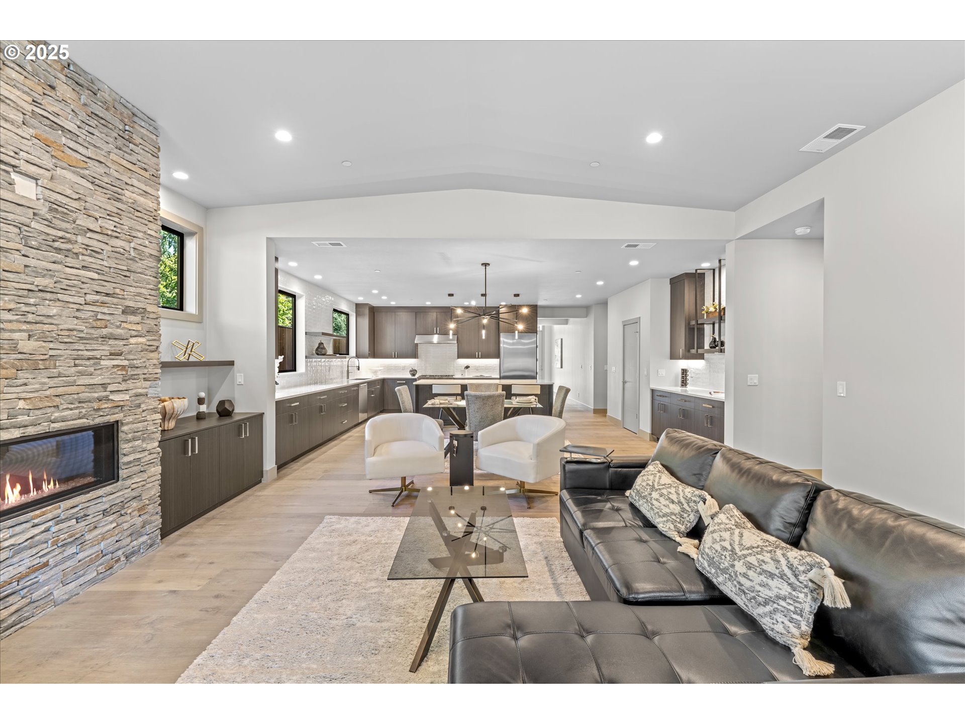 15003 Twin Fir Road Lake Oswego, OR 97035 - Photo 17 of 42 a living room with furniture and a fireplace