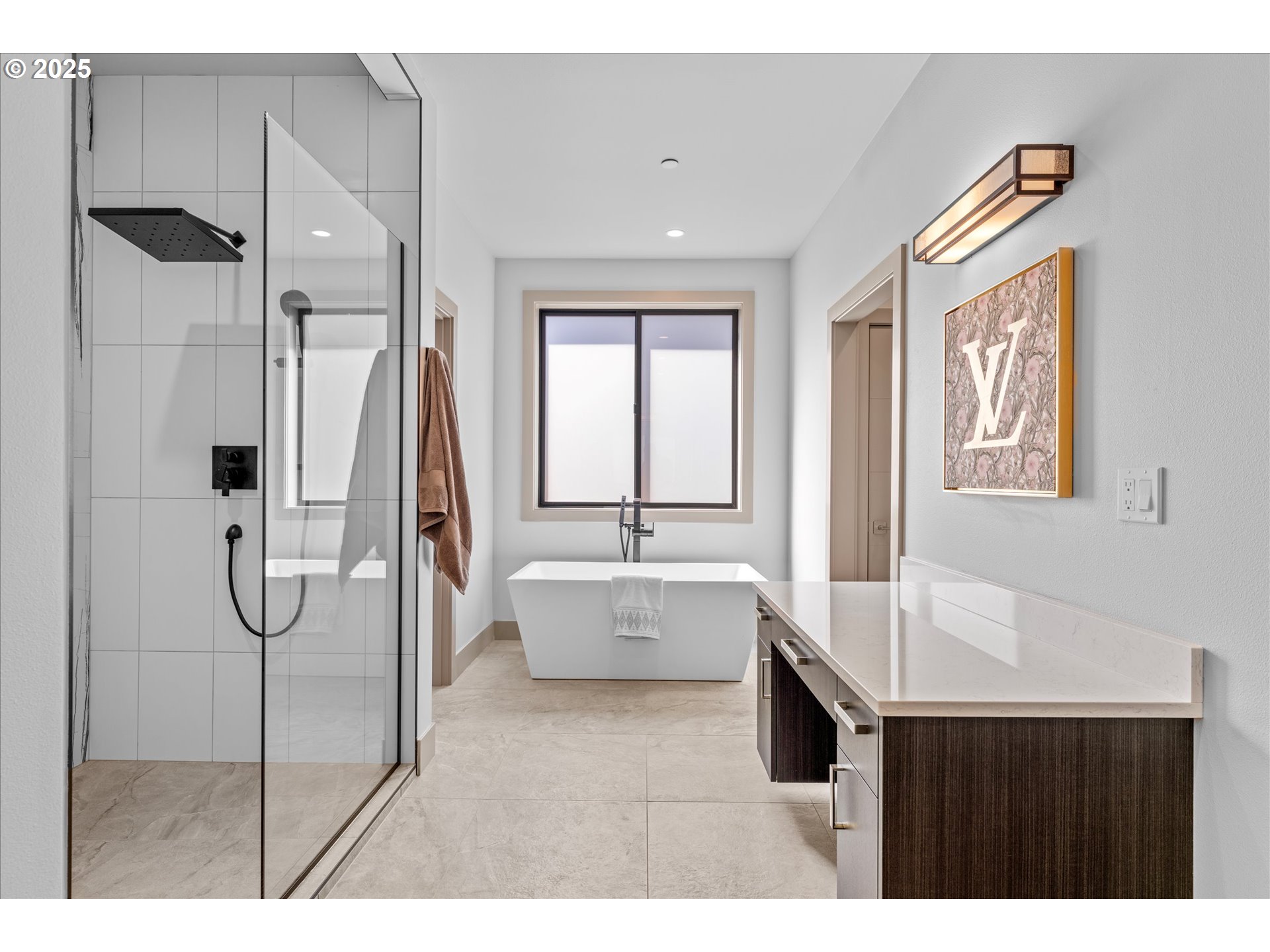 15003 Twin Fir Road Lake Oswego, OR 97035 - Photo 21 of 42 a bathroom with a tub sink and mirror