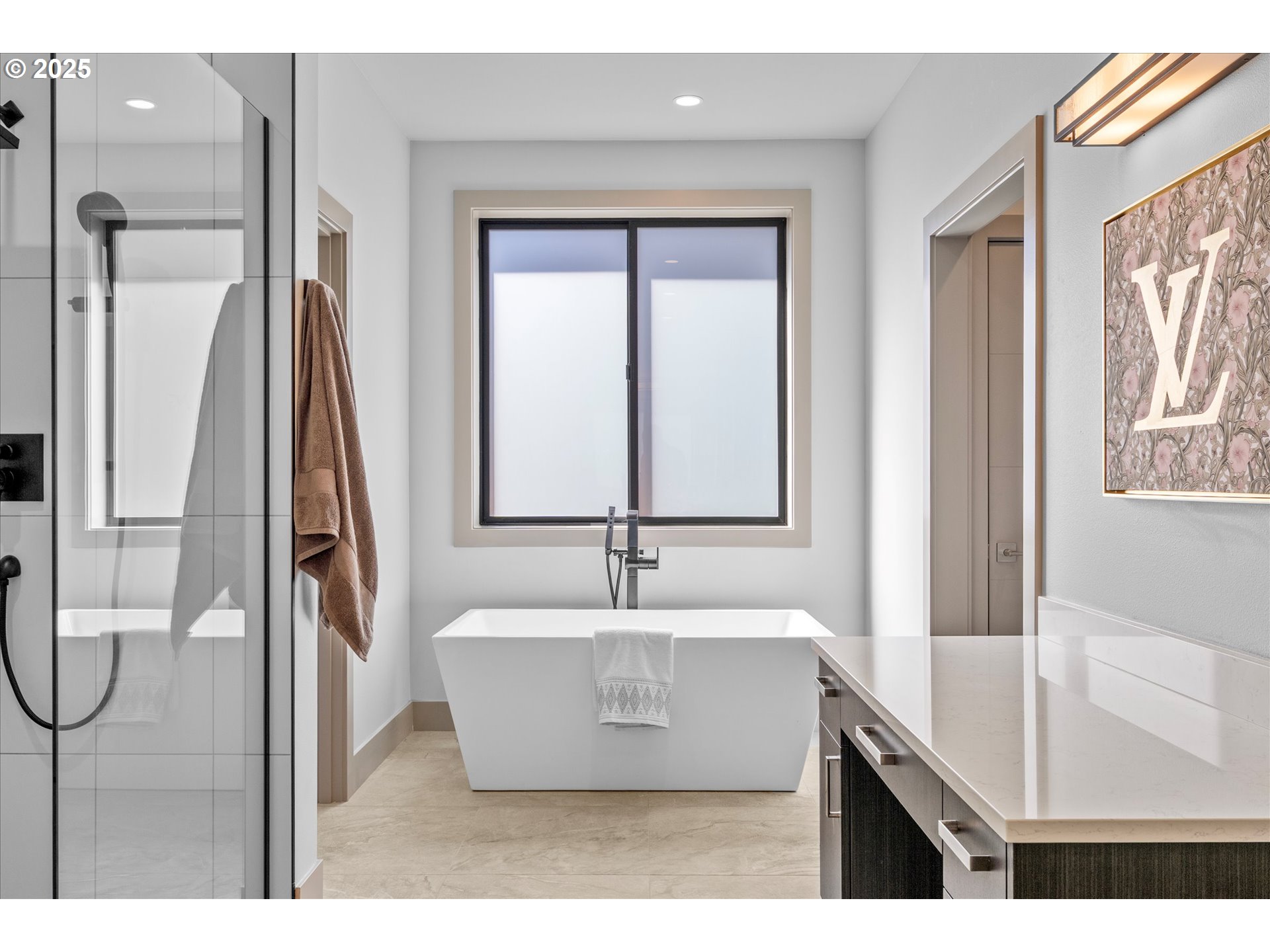 15003 Twin Fir Road Lake Oswego, OR 97035 - Photo 22 of 42 a view of a bathtub in a bathroom