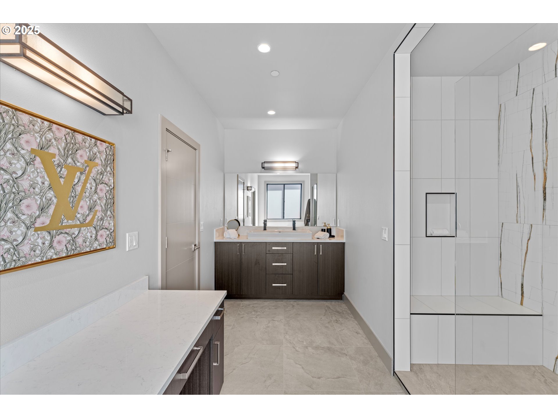 15003 Twin Fir Road Lake Oswego, OR 97035 - Photo 24 of 42 a living room with a couch and a refrigerator