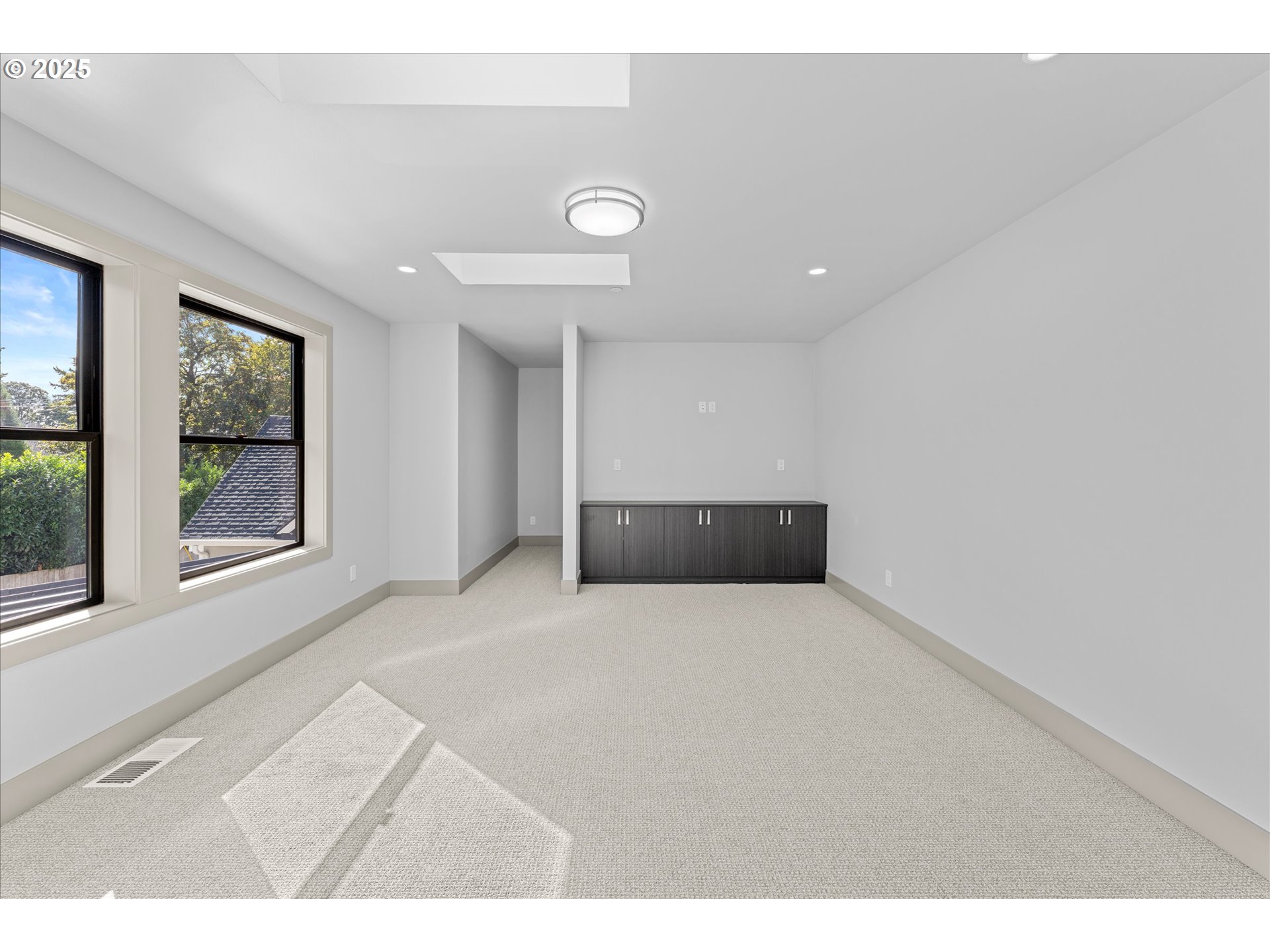 15003 Twin Fir Road Lake Oswego, OR 97035 - Photo 26 of 42 a view of an empty room with a window