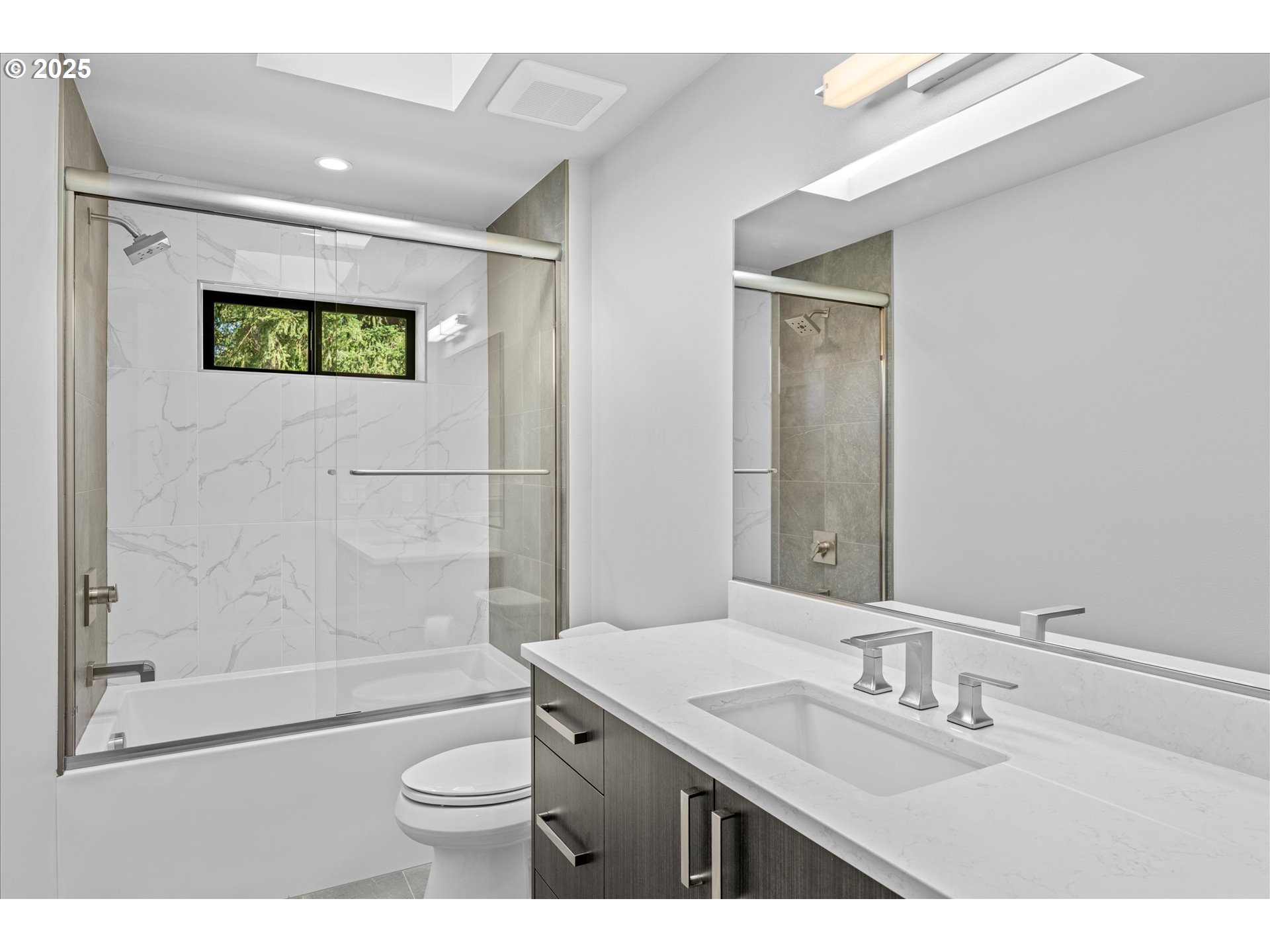 15003 Twin Fir Road Lake Oswego, OR 97035 - Photo 29 of 42 a bathroom with a sink a toilet and shower