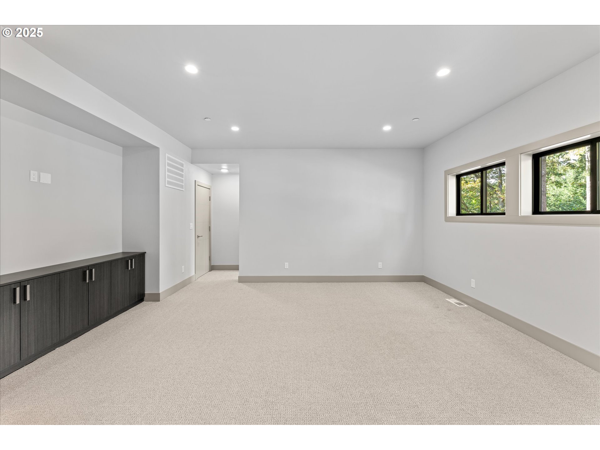 15003 Twin Fir Road Lake Oswego, OR 97035 - Photo 31 of 42 a view of an empty room with a window