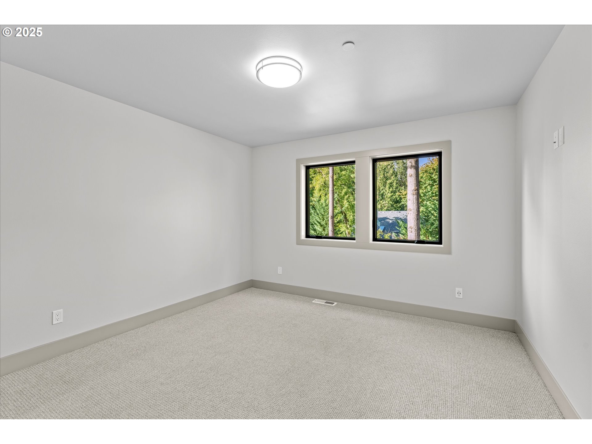 15003 Twin Fir Road Lake Oswego, OR 97035 - Photo 32 of 42 an empty room with windows