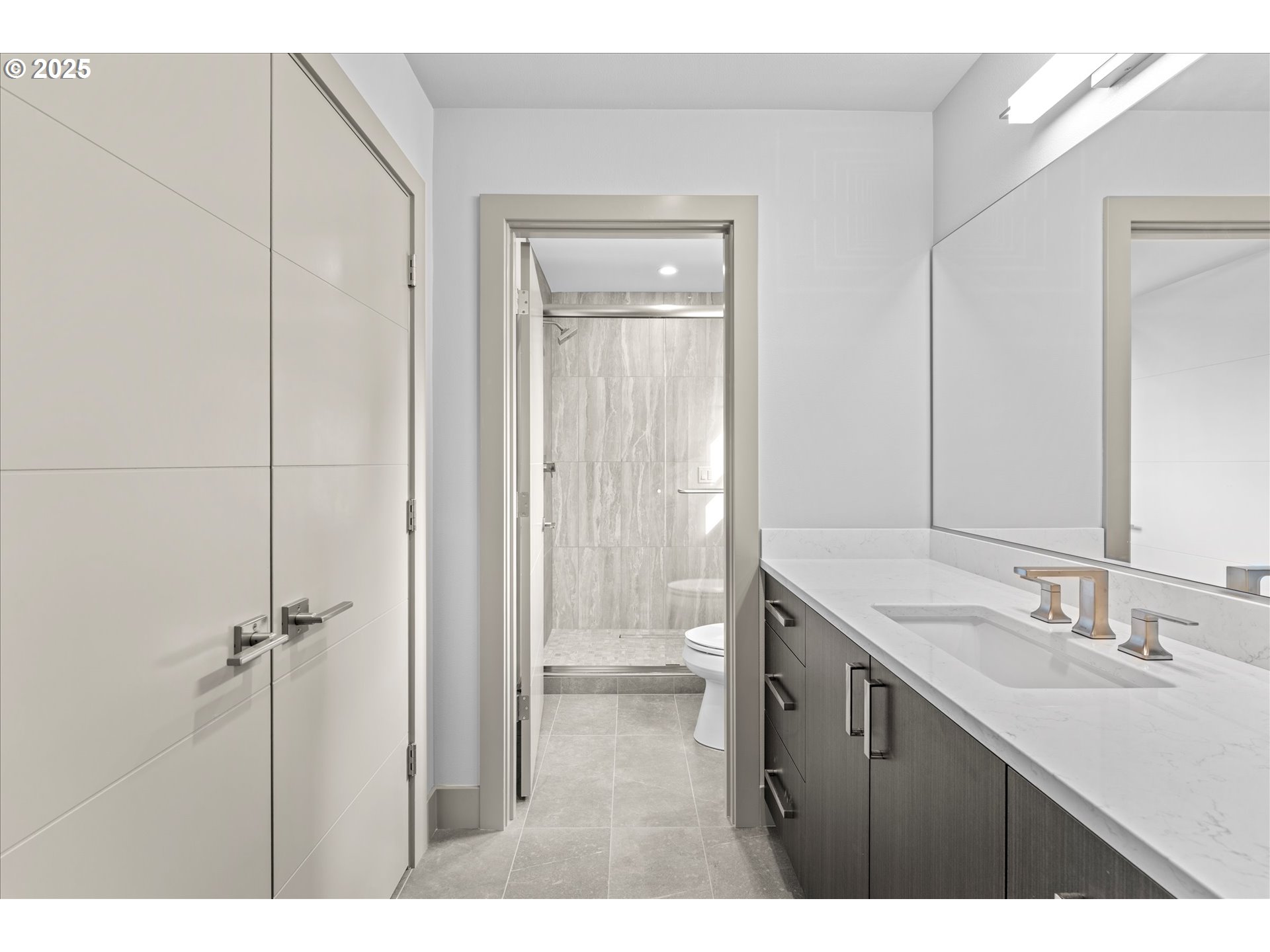 15003 Twin Fir Road Lake Oswego, OR 97035 - Photo 33 of 42 a bathroom with a sink and a mirror