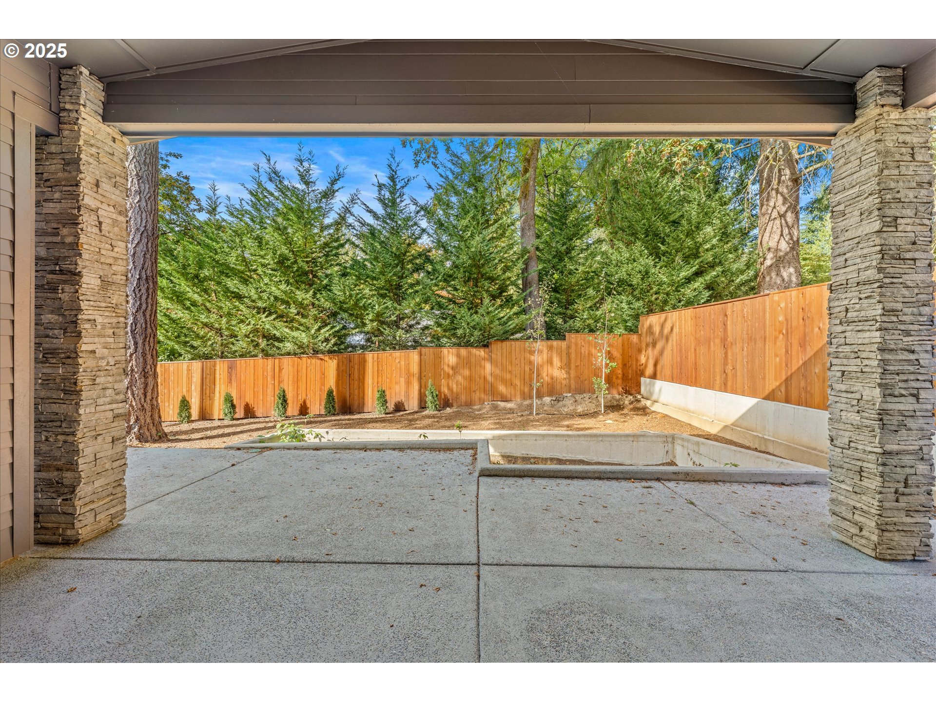 15003 Twin Fir Road Lake Oswego, OR 97035 - Photo 35 of 42 a view of a floor to ceiling window and a yard