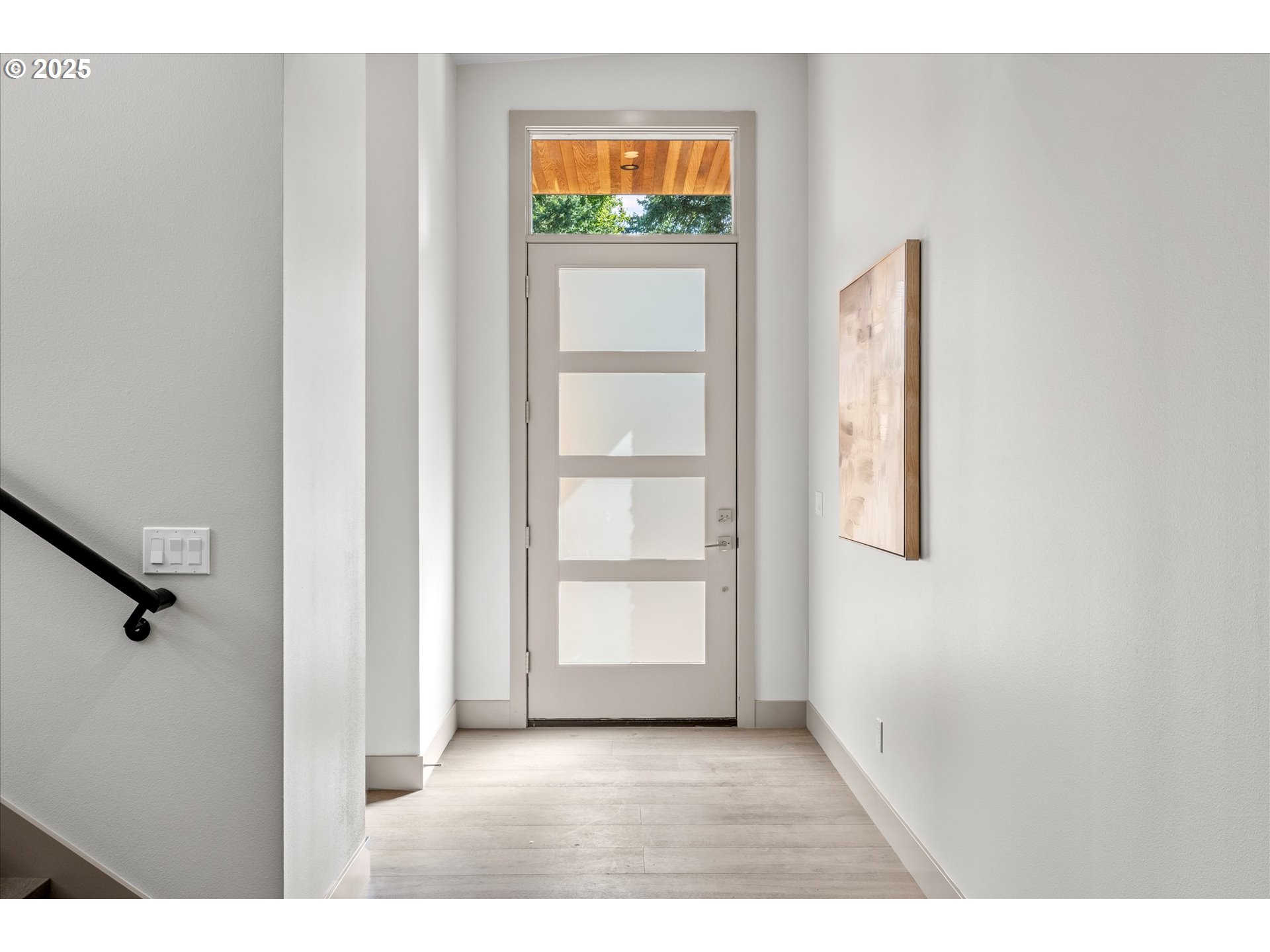 15003 Twin Fir Road Lake Oswego, OR 97035 - Photo 4 of 42 a view of a hallway with a white walls
